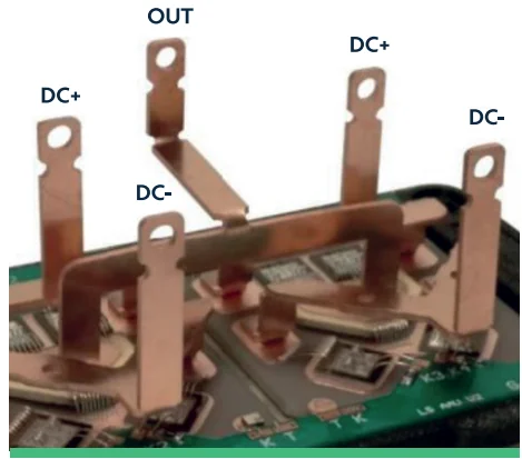 Labeled copper terminals DC+, OUT, and DC− on a custom power module